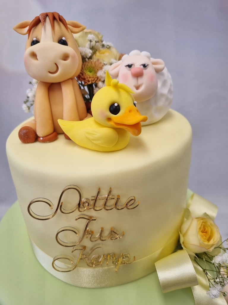 Two-tier Cake with Cute Sugar Animals, and Fresh Flowers